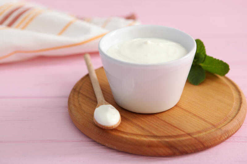 Natural white yogurt on the table