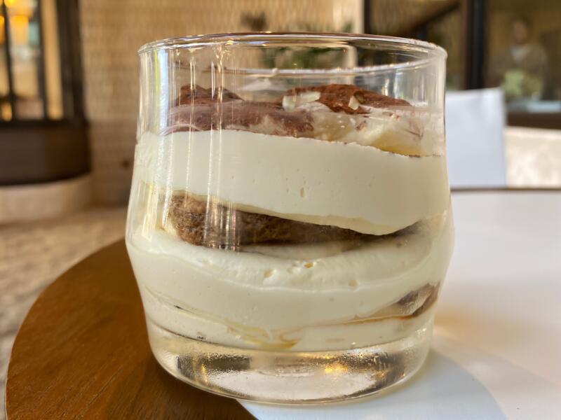 Soft focus of tiramisu portioned in a glass