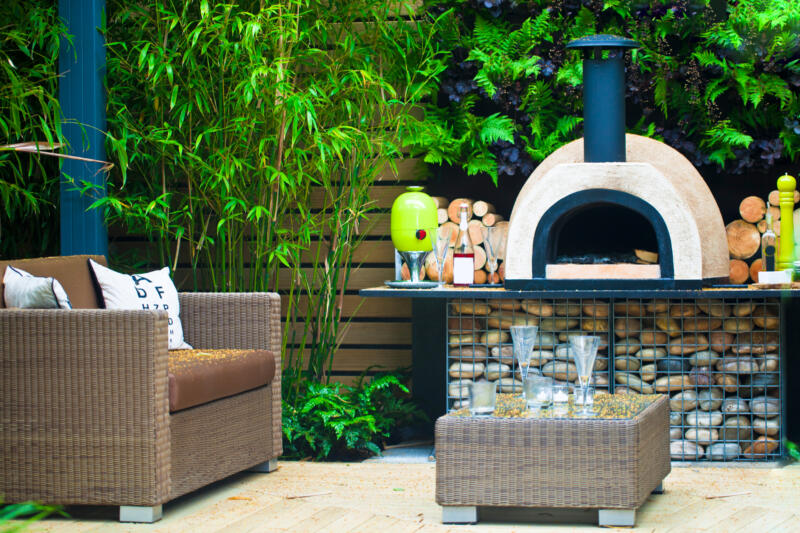 Patio area with a pizza oven