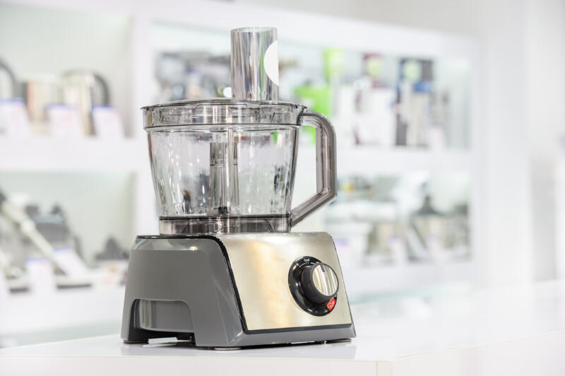 single electric food processor at retail store shelf