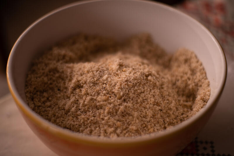 A bowl of ground walnuts flour