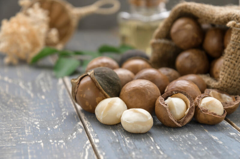 Macadamia nuts on a wooden table