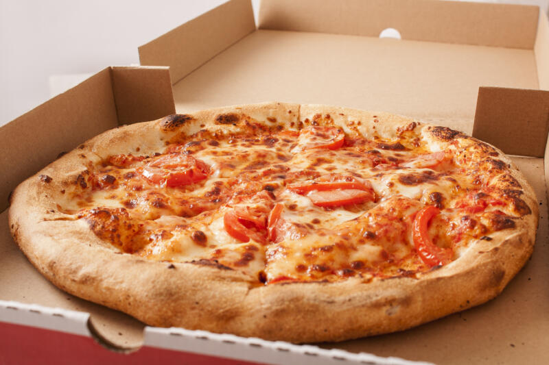 Margherita pizza in a pizza box