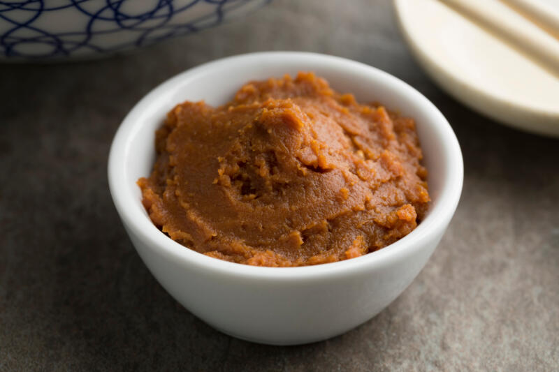 A small bowl with red miso paste