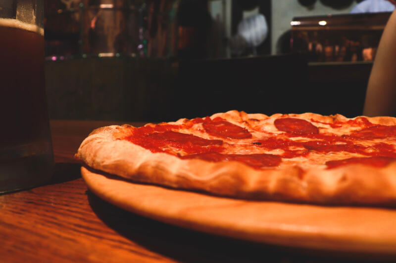 Close-up of salami pizza on a table