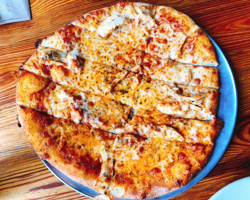 Pizza cut in stripes on a plate