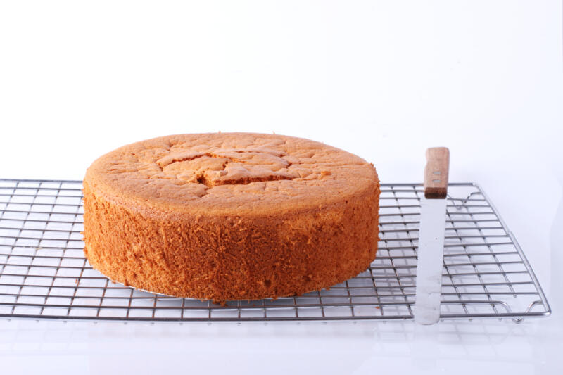 Cooling a freshly baked chiffon cake on a wire rack