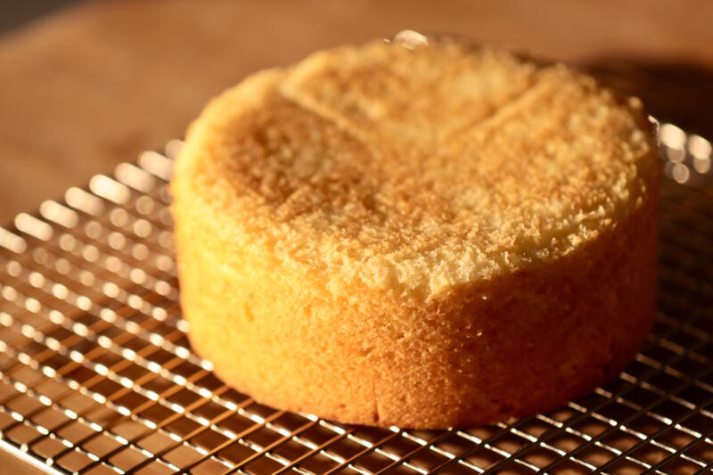 An airy cake on a cooling rack