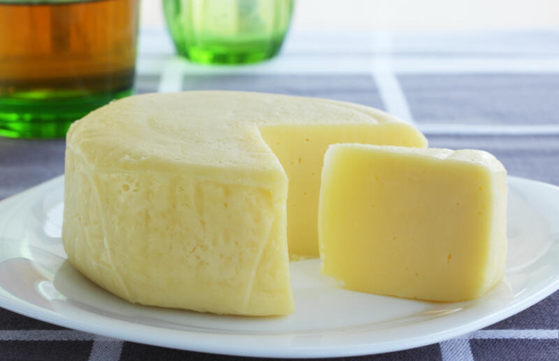 Aged mozzarella cheese on a plate