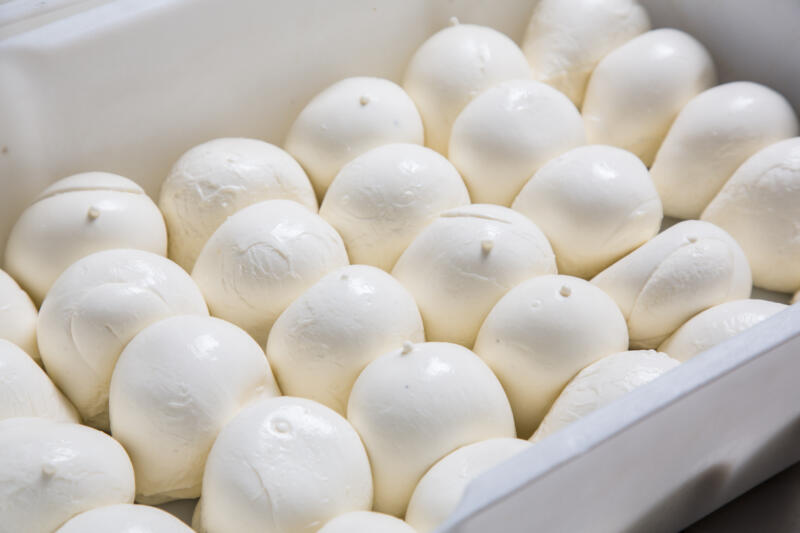 A box of fresh Mozzarella balls close-up