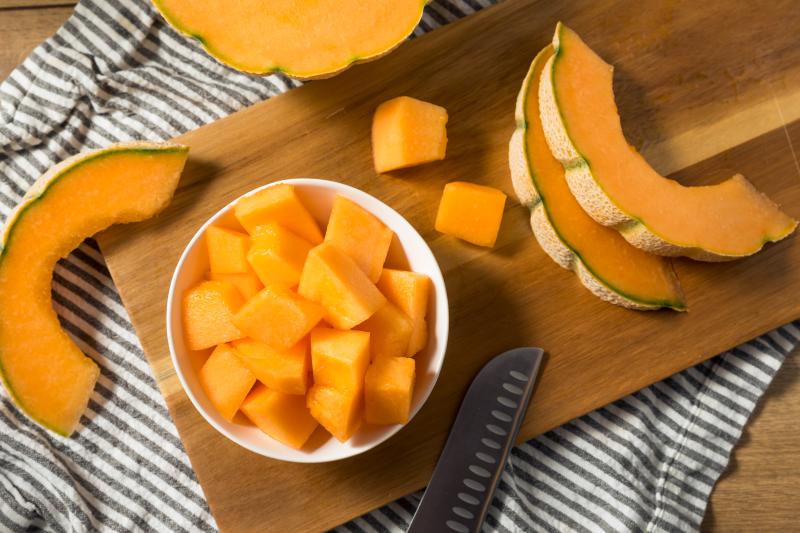 Raw orange organic cantaloupe melon cubes ready to consume