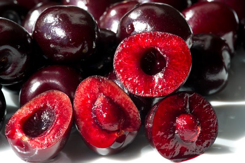 Sweet, ripe cherries cut in half close-up