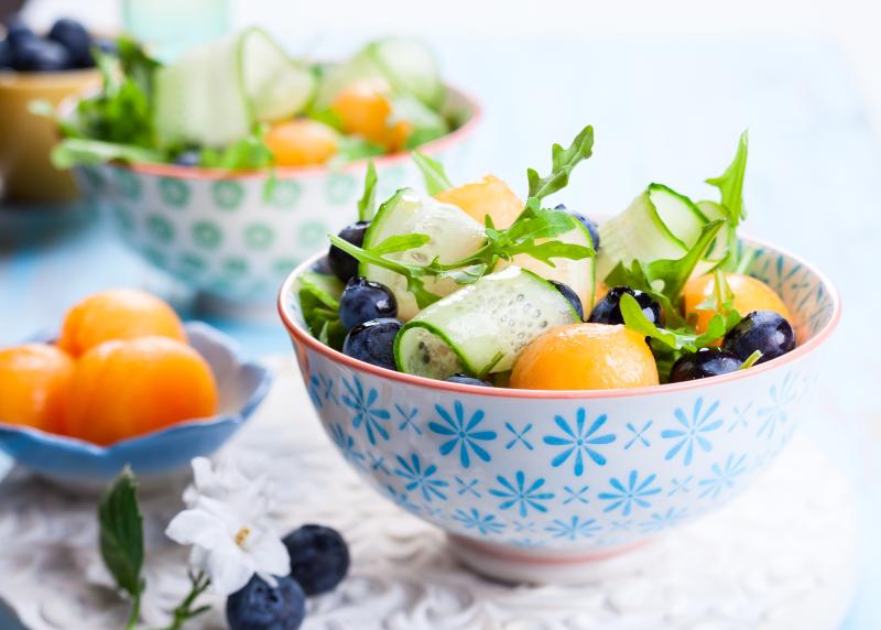 Melon, blueberry and cucumber salad served in bowls